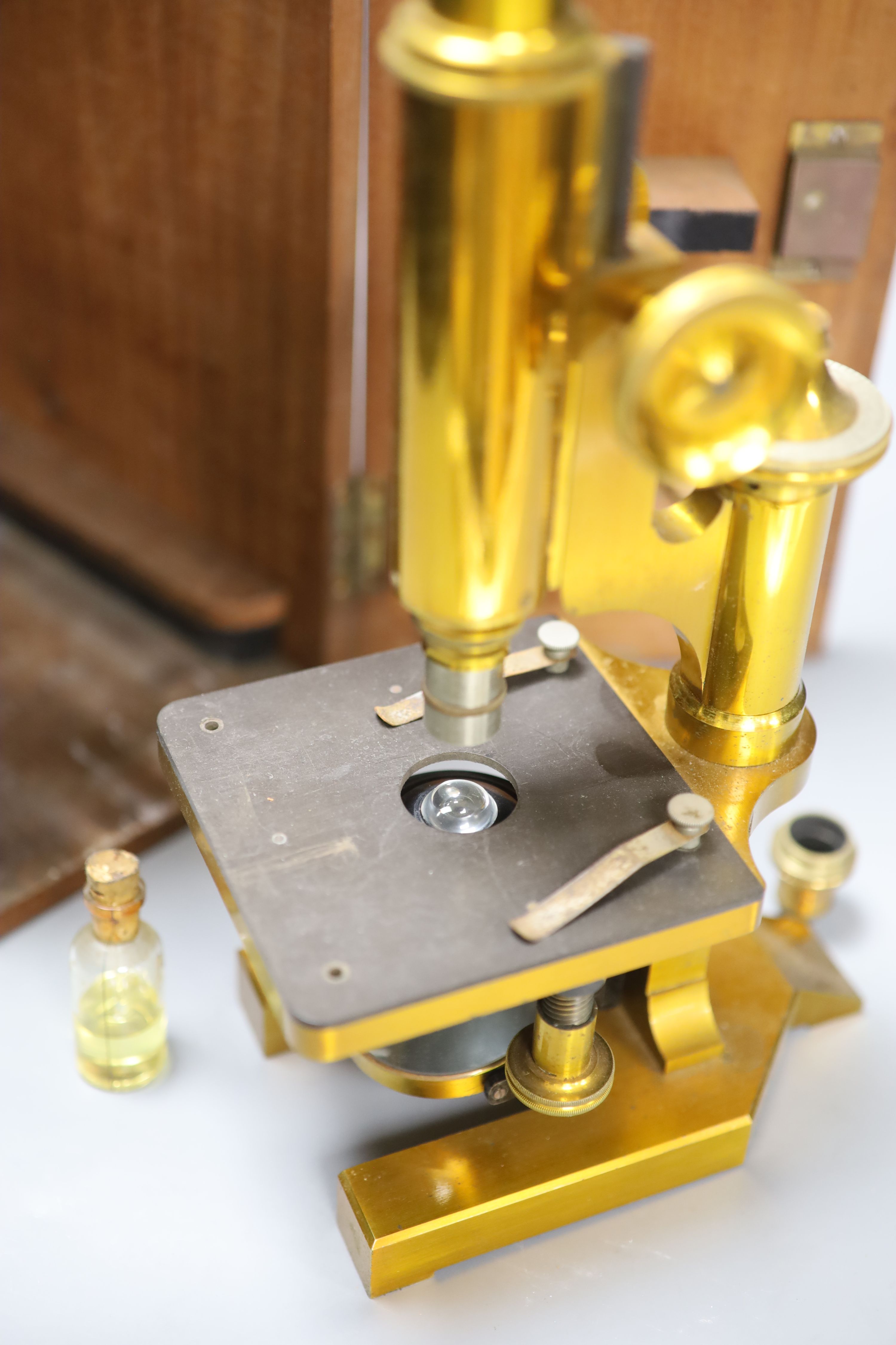 An R & J Beck Ltd brass microscope in case, serial no. 24889